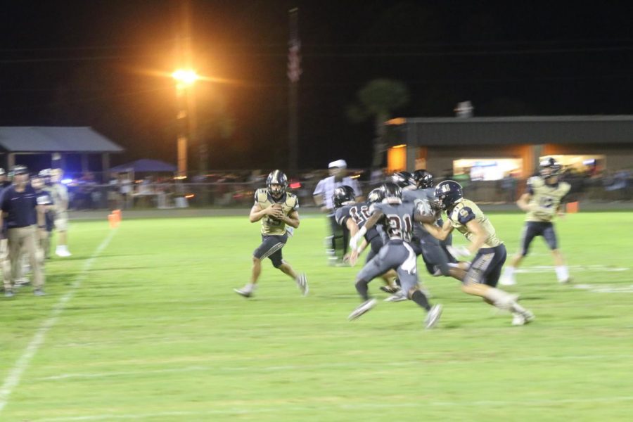 Neck and neck match for rivalry football game against Navarre