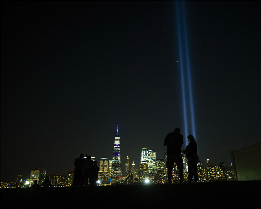 On+the+anniversary+of+9%2F11%2C+the+tribute+light+shines+to+the+sky+where+the+Twin+Towers+once+stood.