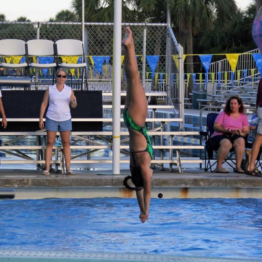 To the left, junior Emi Goto competes at the FHSAA Region 1-3A Championship.
