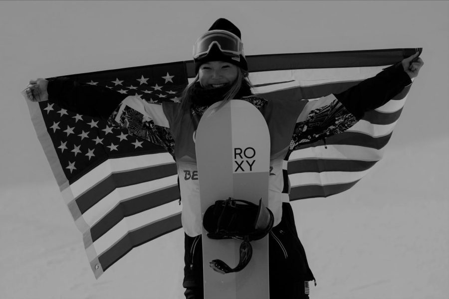 Olympic snowboarder Chloe Kim celebrates winning gold at the 2022 Beijing Olympics on the women’s halfpipe.