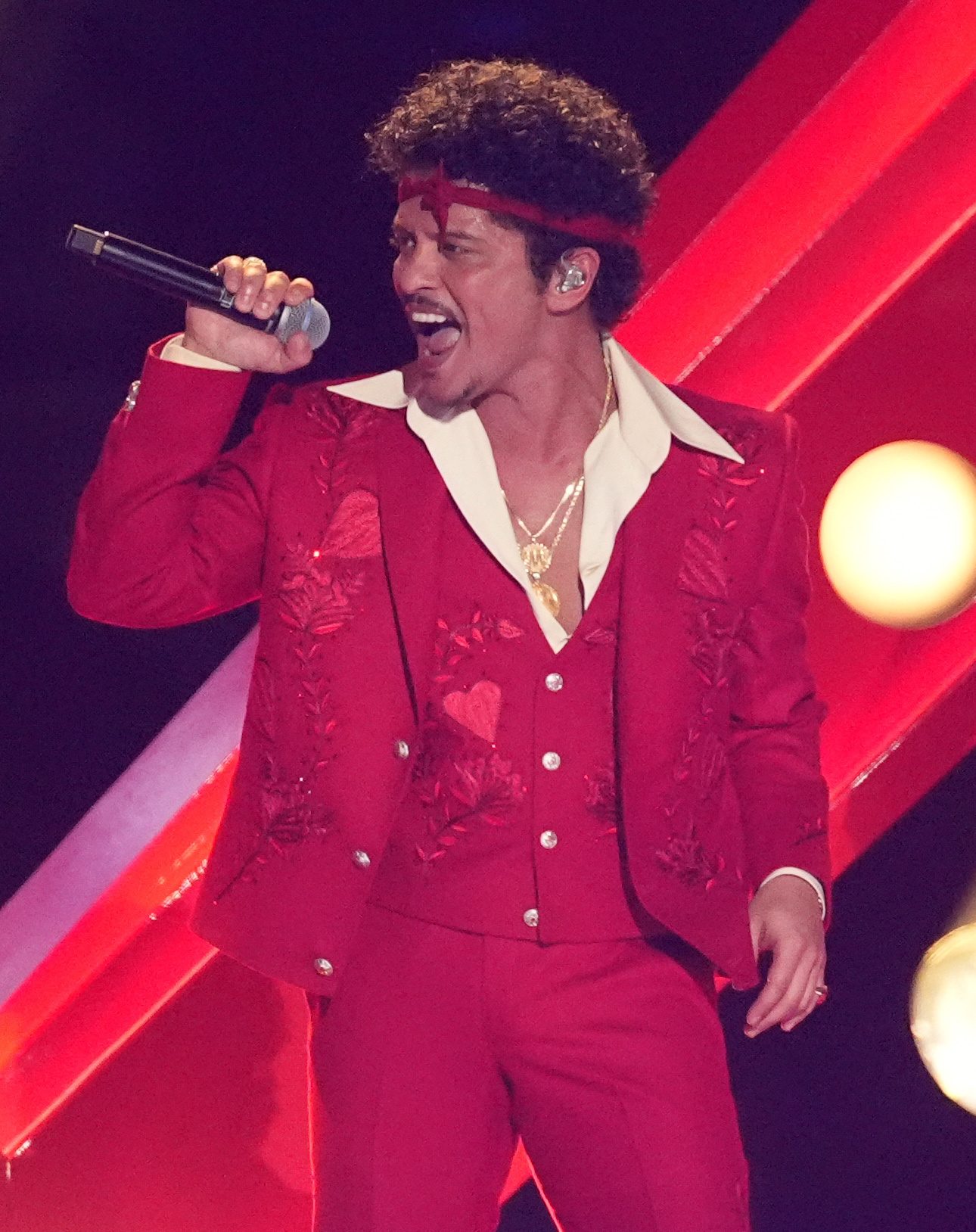 Bruno Mars performs "I Just Might" during the 68th annual Grammy Awards on Sunday, Feb. 1, 2026, in Los Angeles. (AP Photo/Chris Pizzello)